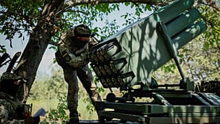 A Ukrainian soldier prepares a Croatian RAK-SA-12 128mm multiple rocket launcher to fire towards the Russian positions. Monday, July 10, 2023. 