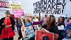Protesters in Portland in Dorset after the Bibby Stockholm accommodation barge arrived.