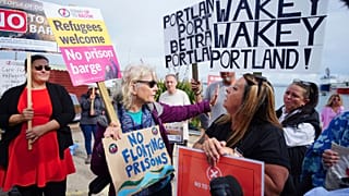 Protesters in Portland in Dorset after the Bibby Stockholm accommodation barge arrived.