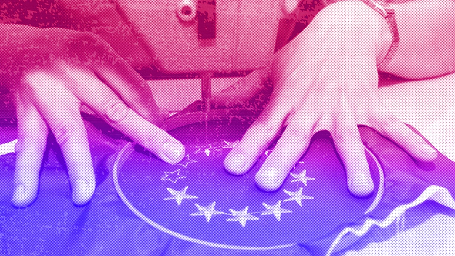 A seamstress stitching starts on a European flag patch in Budapest, April 2003