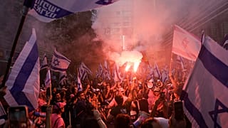 Israelis protest against plans by Prime Minister Benjamin Netanyahu's government to overhaul the judicial system in Tel Aviv, Israel, Tuesday, July 18, 2023.