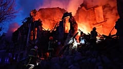 Emergency services work at a scene of destroyed residential area after a Russian attack in Mykolaiv, Ukraine, Thursday, July 20, 2023. 