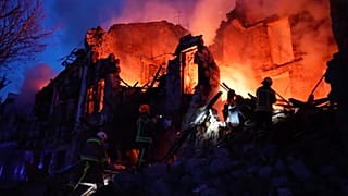 Emergency services work at a scene of destroyed residential area after a Russian attack in Mykolaiv, Ukraine, Thursday, July 20, 2023.