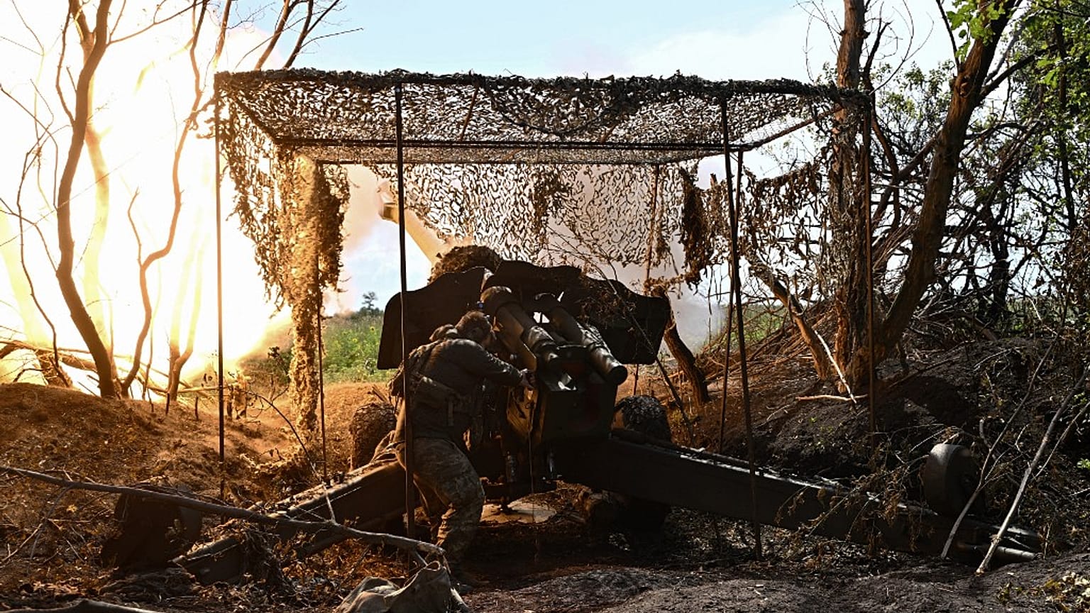 A Ukrainian artilleryman fires a 152 mm towed gun-howitzer D-20 at Russian positions on the front line near Bakhmut, eastern Ukraine, on July 20, 2023.