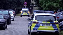 Police patrol during a search operation for a dangerous wild animal near the village of Kleinmachnow in the southern suburbs of Berlin, Germany.