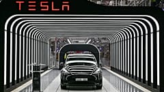 An electric vehicle of the model Y is pictured during the start of the production at Tesla's "Gigafactory" on March 22, 2022 in Gruenheide, southeast of Berlin. 