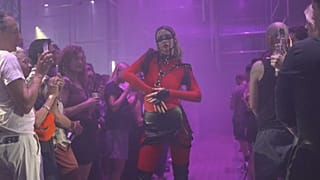 Model walks down the runway at fashion show by kink label The Code at Dark Matter venue, part of Berlin Fashion Week.