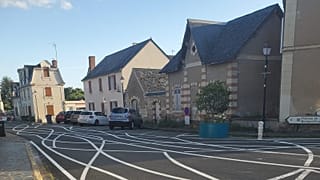 New white lines were drawn to force drivers to slow down at an intersection in the French village of Bauné near Angers.