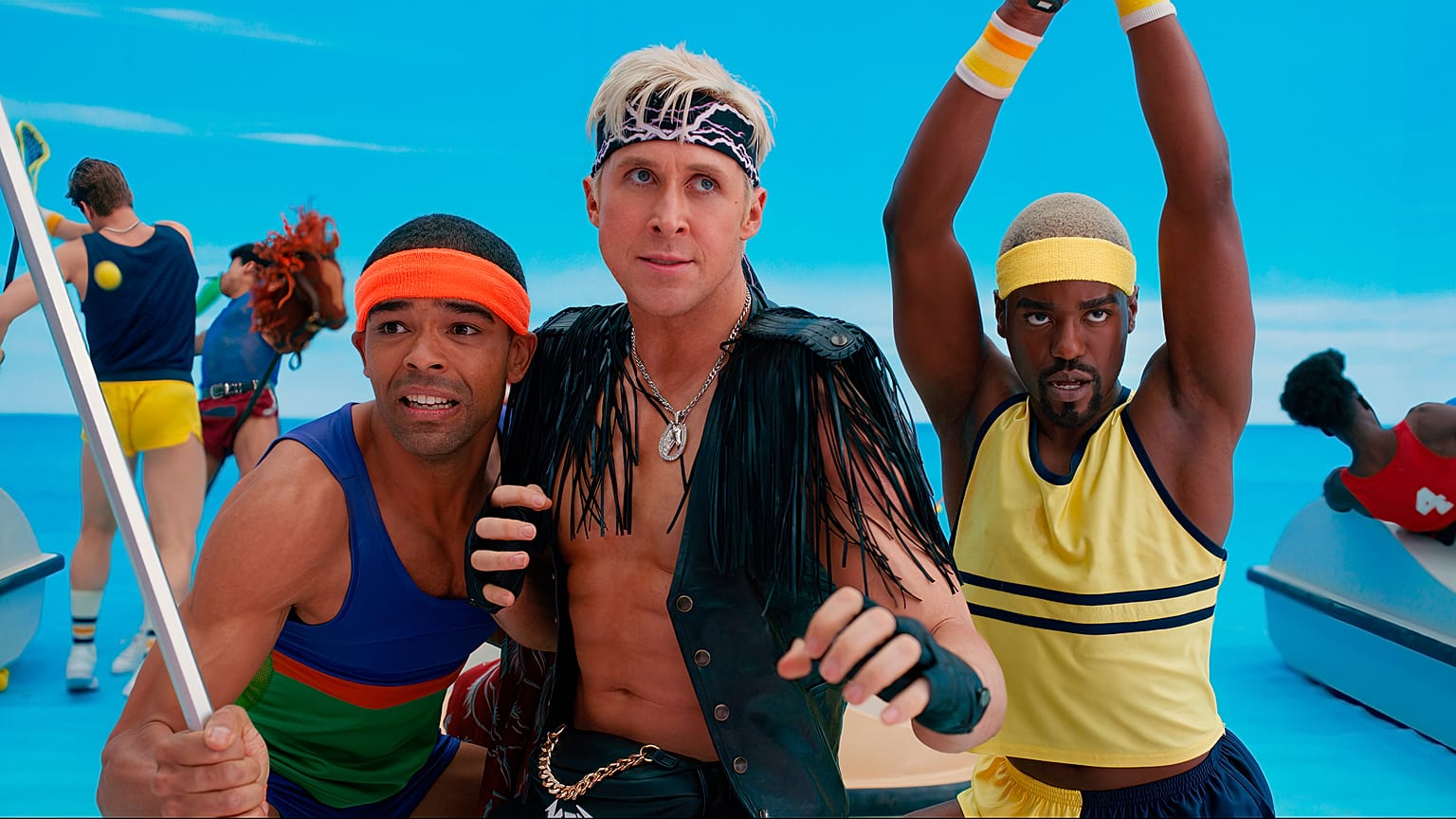 This image released by Warner Bros.Pictures shows Kingsley Ben-Adir, from left, Ryan Gosling and Ncuti Gatwa in a scene from "Barbie."