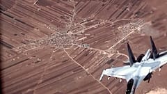Rus Su-35 uçağı, Suriye üzerinde ABD Hava Kuvvetleri'ne ait bir MQ-9 Reaper insansız hava aracının yakınında uçuyor. 5 Temmuz 2023 