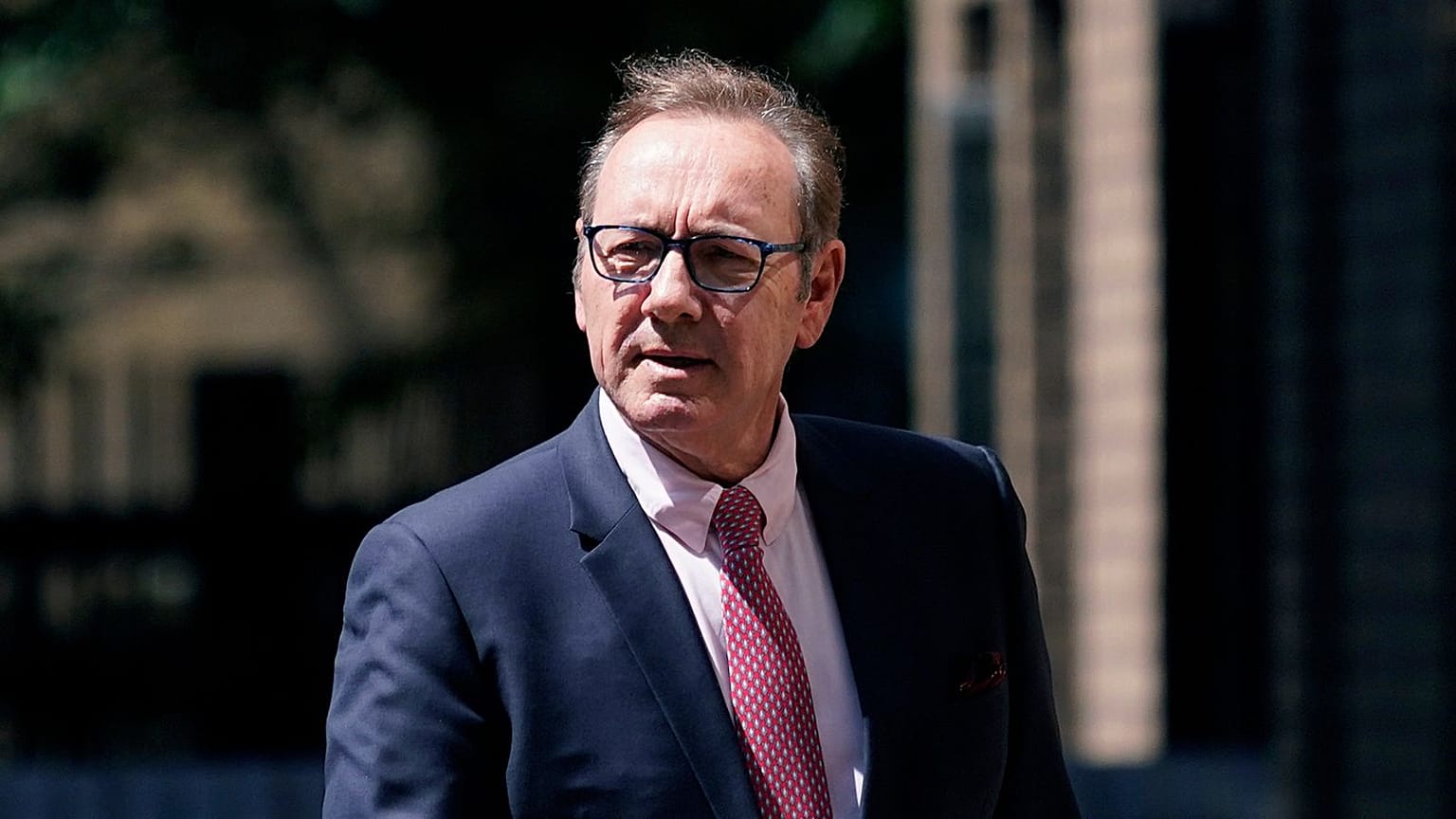 Kevin Spacey walks outside Southwark Crown Court in London - Wednesday 26 July 2023