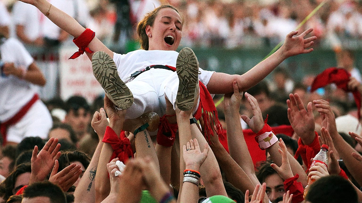 Woman crowd surfing at the Bayonne festival