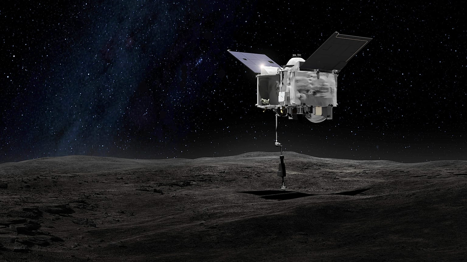 Imagen de la nave espacial OSIRIS-REx (Origins Spectral Interpretation Resource Identification Security - Regolith Explorer) en contacto con el asteroide Bennu.