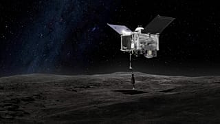 Imagen de la nave espacial OSIRIS-REx (Origins Spectral Interpretation Resource Identification Security - Regolith Explorer) en contacto con el asteroide Bennu.