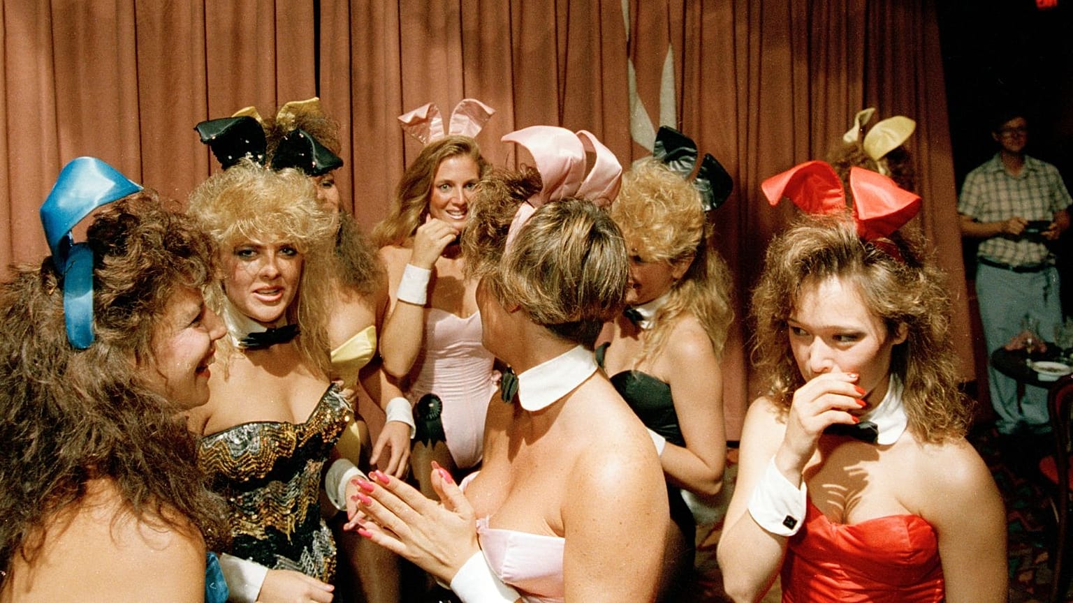 Unidentified Playboy bunnies congregate at closing time on the last night of business in Lansing