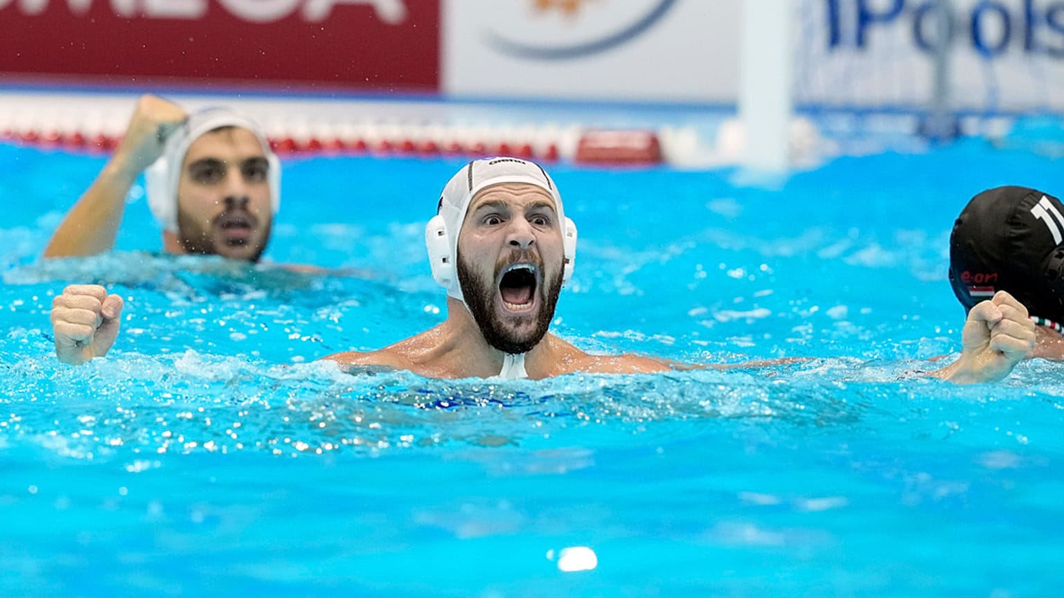 Greece's Konstantinos Genidounias celebrates after scoring a goal against Hungary during their men's water polo gold medal match at the World Swimming Championships in Fukuoka