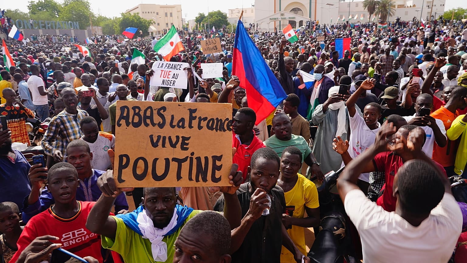 Nigeriens participate in a march called by supporters of coup leader Gen. Abdourahmane Tchiani in Niamey, Niger, Sunday, July 30, 2023