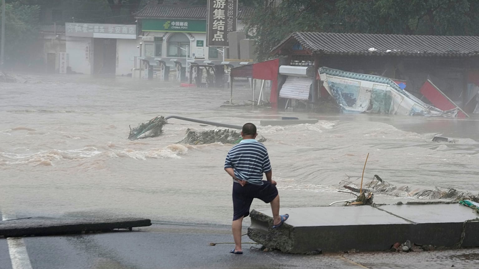 Flood waters in the Miaofengshan region on the outskirts of Beijing, 1 August 2023