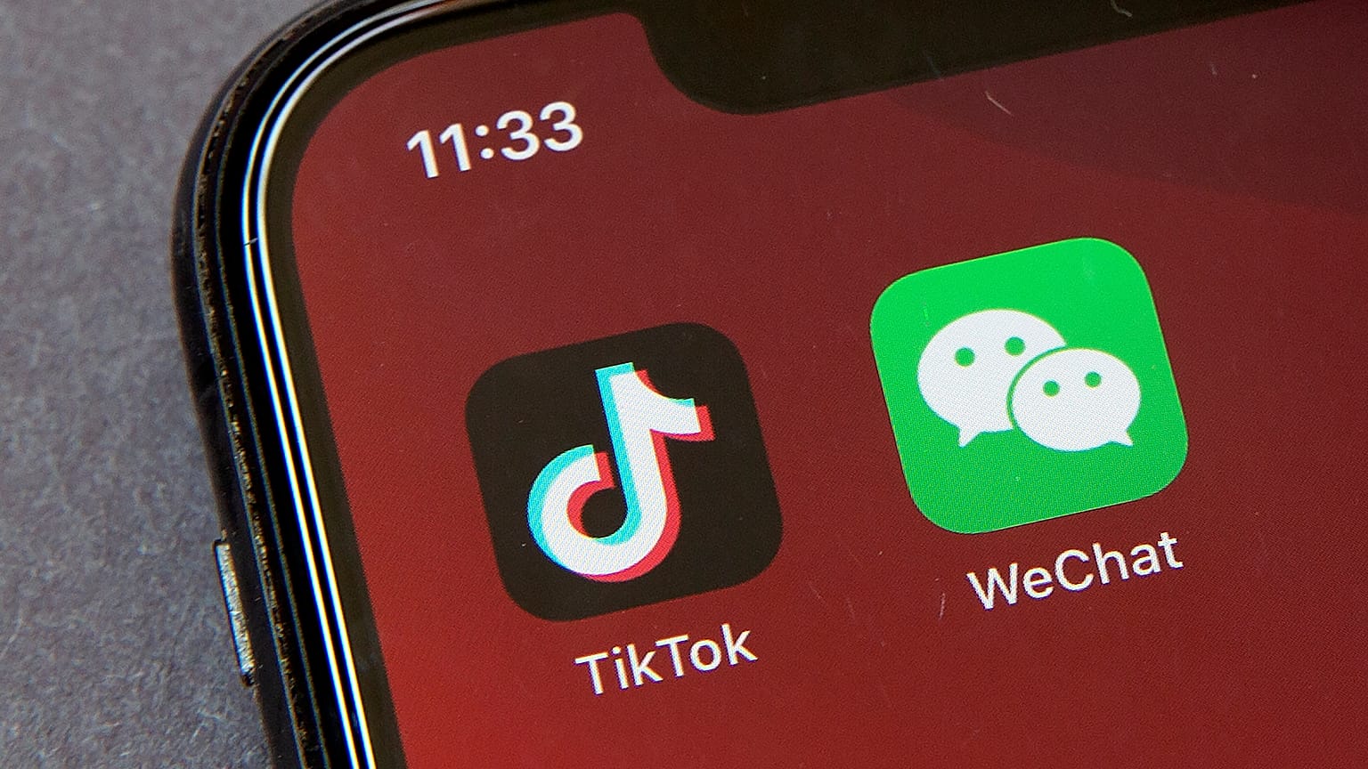 Icons for the smartphone apps TikTok and WeChat are seen on a smartphone screen in Beijing.