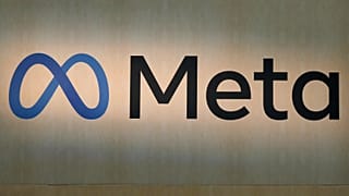A Meta sign is displayed at the company's booth at the Game Developers Conference 2023 in San Francisco