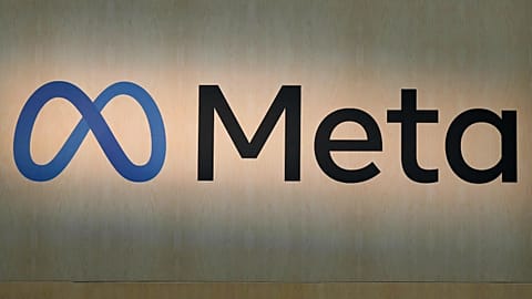 A Meta sign is displayed at the company's booth at the Game Developers Conference 2023 in San Francisco