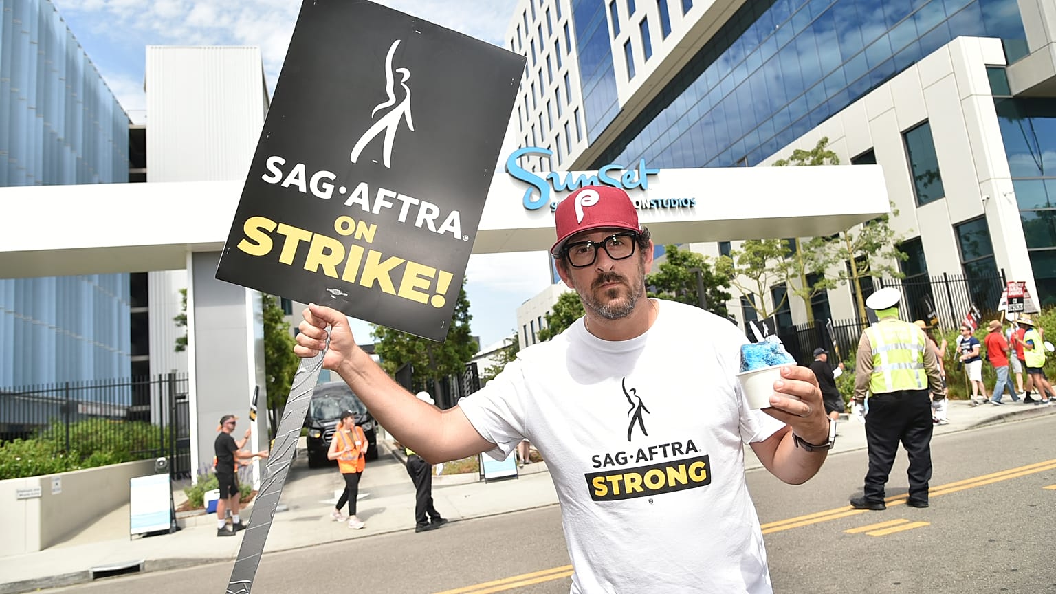 Adam Shapiro poses on a picket line outside Netflix studios on Tuesday, Aug. 1, 2023, in Los Angeles. 