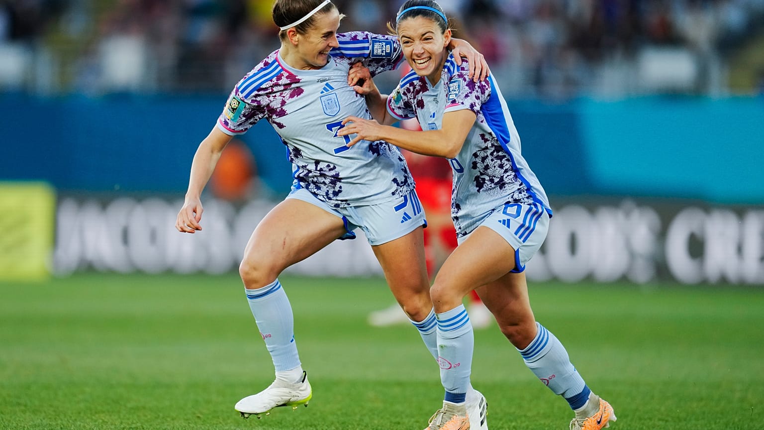 Aitana Bonmati is congratulated by Teresa Abelleira after scoring Spain's first goal against Switzerland 