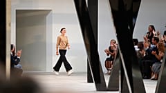 British fashion designer Phoebe Philo arrives after Celine's Spring/Summer 2015 ready-to-wear fashion collection presented in Paris, France, Sunday, Sept. 28, 2014.