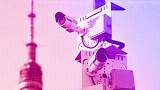Surveillance cameras sit on a utility pole in Moscow, February 2020