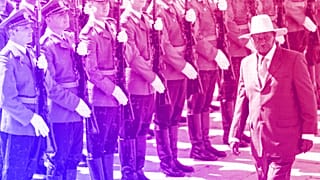 Uganda's President Yoweri Museveni reviews the honour guard in Belgrade, July 2023