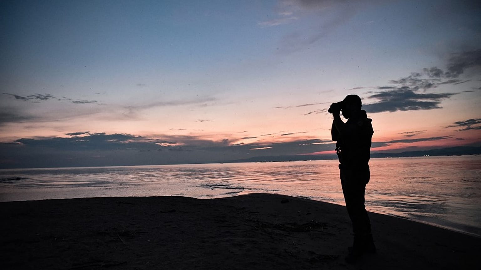 A Police officer patrols the delta of Evros river, near Alexandroupoli, along the Greek-Turkish border, on June 8, 2021.