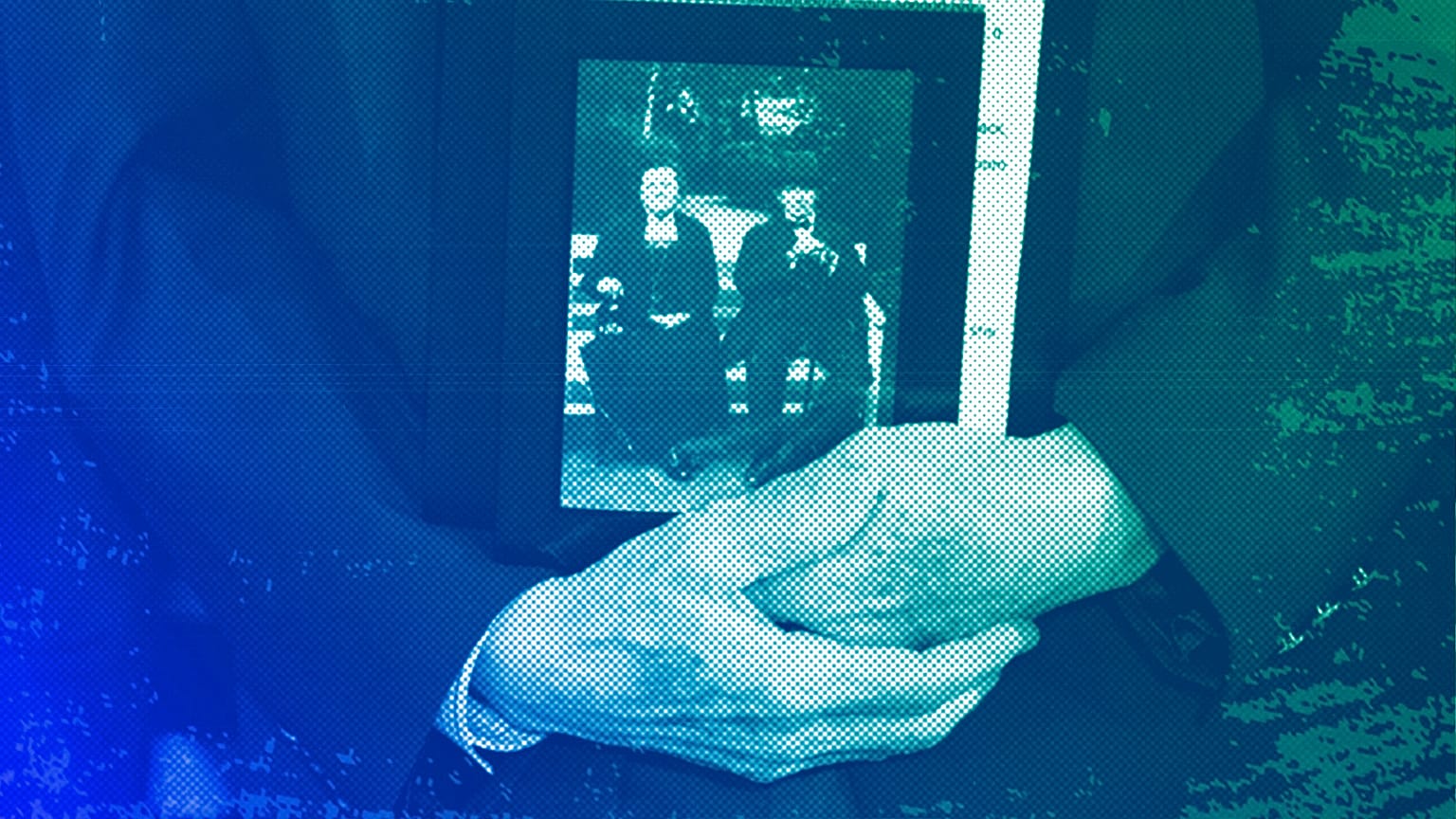 Holocaust survivor Peter Stein holds a photograph of his grandparents during the 2023 Days of Remembrance commemoration, Washington DC, April 2023