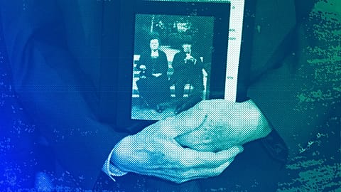 Holocaust survivor Peter Stein holds a photograph of his grandparents during the 2023 Days of Remembrance commemoration, Washington DC, April 2023