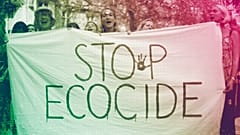 Extinction Rebellion climate change protesters hold a banner in central London, April 2019
