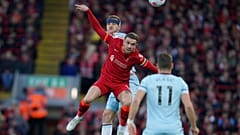 Jordan Henderson, centre, playing in an English Premier League match between Liverpool and West Ham United.