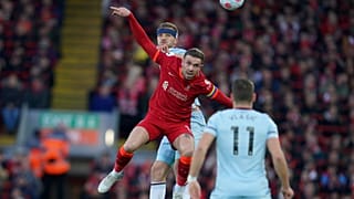 Jordan Henderson, centre, playing in an English Premier League match between Liverpool and West Ham United.
