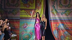  Dua Lipa and Donatella Versace at the end of Versace's Spring/Summer 2022 show in Milan