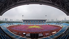 Die kollektive Yoga-Übung im Nationalstadion von Hanoi