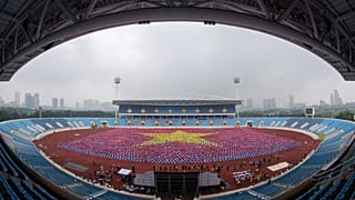 Die kollektive Yoga-Übung im Nationalstadion von Hanoi