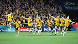 Australia players celebrate after winning the Women's World Cup quarterfinal 