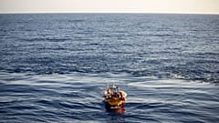 Migrants are carried by a Médecins Sans Frontières rescue team boat after being rescued in the Mediterranean Sea, Monday, Aug. 7, 2023.
