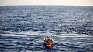 Migrants are carried by a Médecins Sans Frontières rescue team boat after being rescued in the Mediterranean Sea, Monday, Aug. 7, 2023.