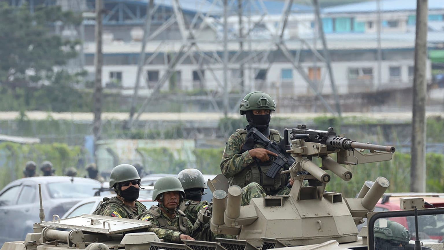 Armored vehicles enter the Deprivation of Liberty Center of the Zone 8 in Guayaquil, Ecuador, Saturday, Aug. 12, 2023.