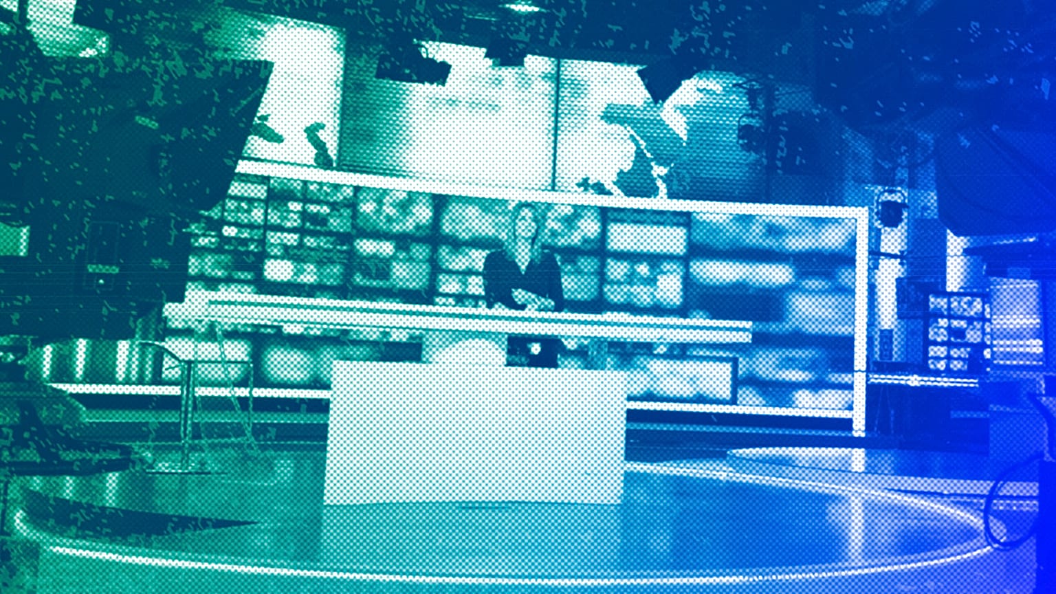 Dagmara Kaczmarek-Szałkow, a news presenter for TVN24, speaks during a live news broadcast in Warsaw, December 2021