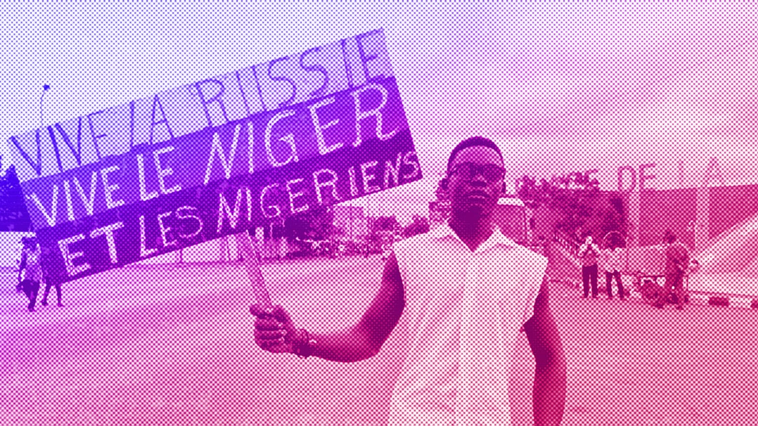 A supporter of Niger's ruling junta at the start of a protest in Niamey, July 2023