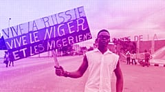 A supporter of Niger's ruling junta at the start of a protest in Niamey, July 2023