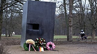 Wreaths have been laid in front of the Memorial to Homosexuals Persecuted Under Nazism in Berlin.