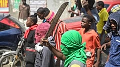 Vermummte Bandenmitglieder in Port-au-Prince