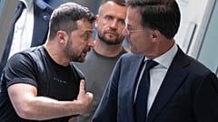 Ukrainian President Volodymyr Zelenskyy, left, and Dutch caretaker Prime Minister Mark Rutte.