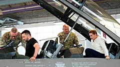 Ukrainian President Volodymyr Zelenskyy and Denmark's Prime Minister Mette Frederiksen sit in a F-16 fighter jet at Skrydstrup Airbase, Denmark, Sunday, Aug. 20, 2023